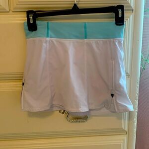 Blue and white Athleta Girl tennis skirt